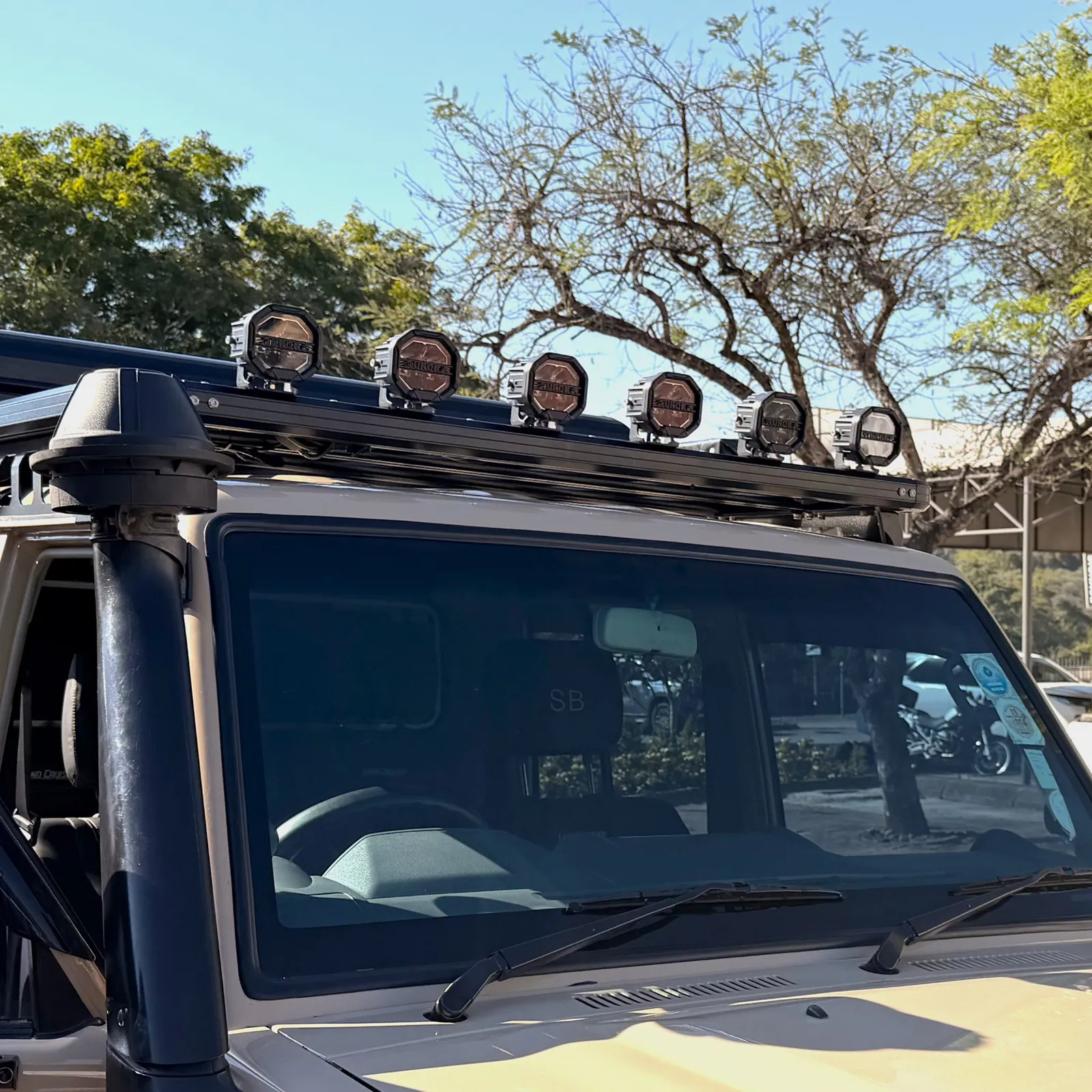 Onca roof rack and mirror brackets — Delta Cruiser — Alublack Tray & Canopy Touring 79, fitted by Venture 4x4 in Nelspruit