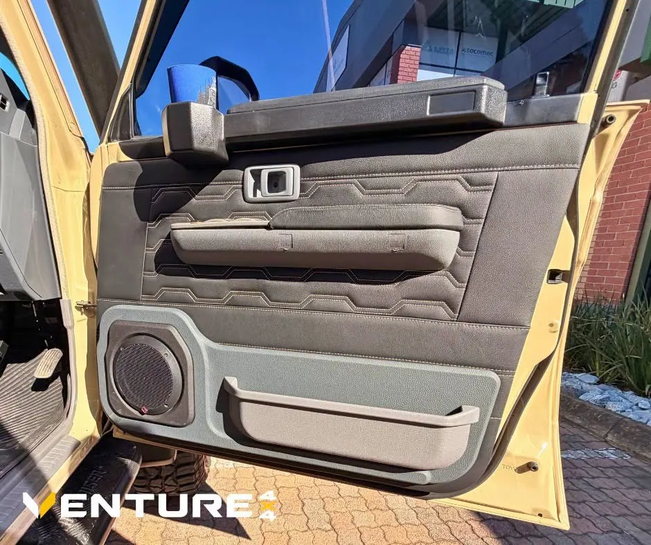 Leather door panel upholstery — Delta Cruiser — Alublack Tray & Canopy Touring 79, fitted by Venture 4x4 in Nelspruit