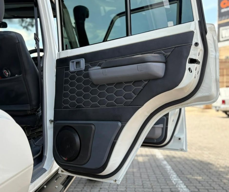 Leather-trimmed door panels — Bravo Cruiser — ARB & Onca Equipped Land Cruiser 79, fitted by Venture 4x4 in Nelspruit