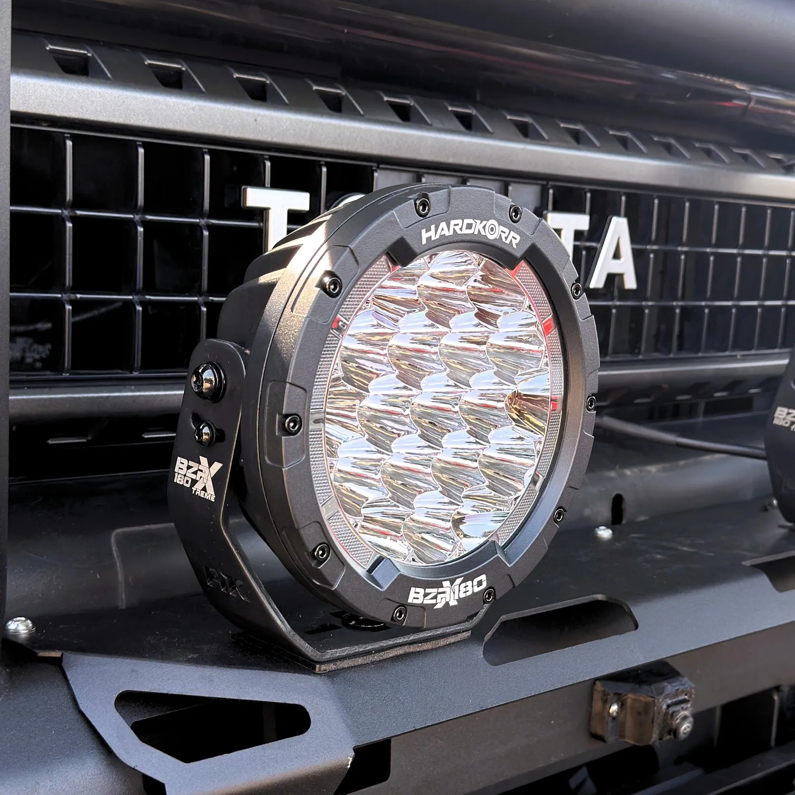 Hardkorr LED spotlight mounted in the bull bar — Echo Cruiser — JMACX Alpha & Gobi-X Land Cruiser Prado 250, fitted by Venture 4x4 in Nelspruit